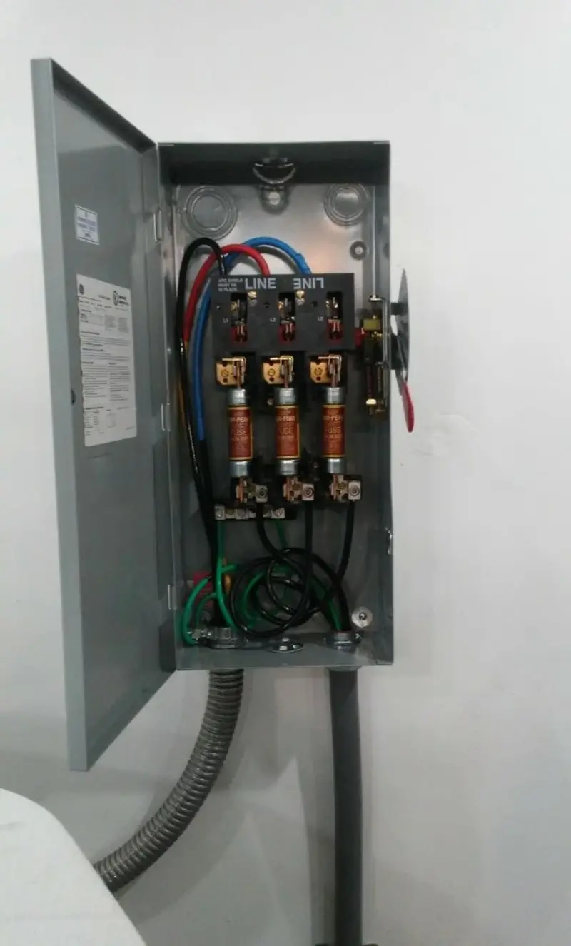 Three-phase disconnect switch installed for Smoke Detector Installation in Amherst